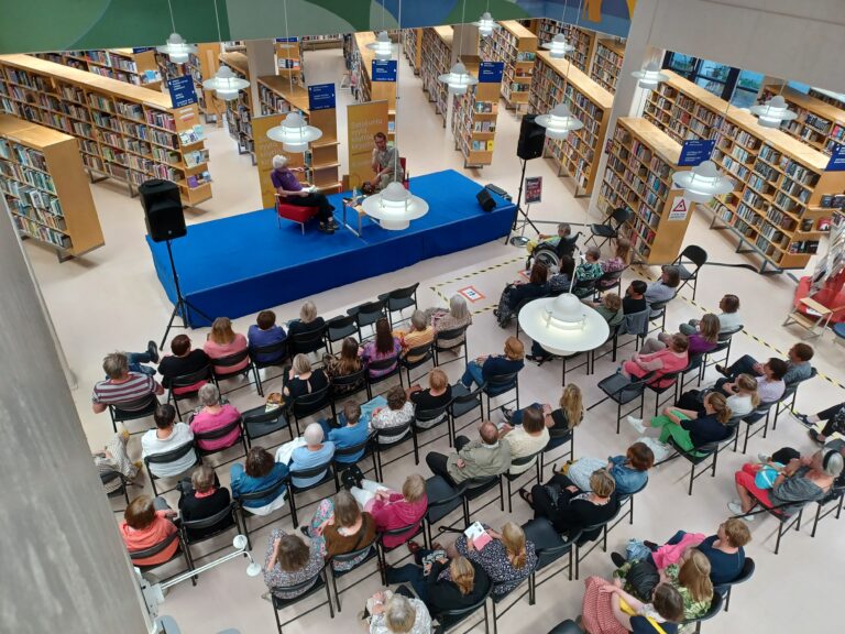Audience watching at a presentation in Pori main library